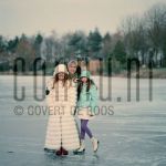 11-01-2003 Familie Paay Curry Patricia Paay, Adam Curry and Christina at home in Belgium. January 11, 2003.

[keywords]On ice, Fur coat, Ice-Skates[/keywords]